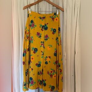No brand. Long buttoned floral skirt . Size S-M.